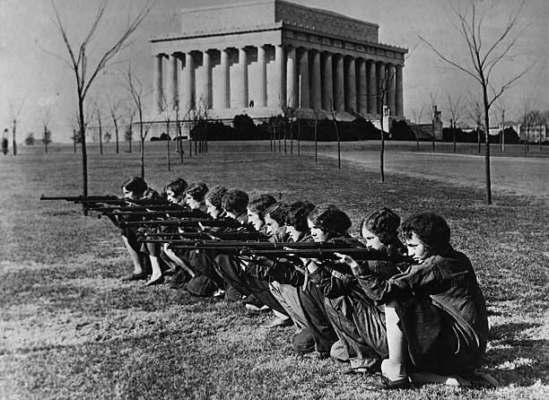 15 Stunning Vintage Photos of Women Posing with Guns